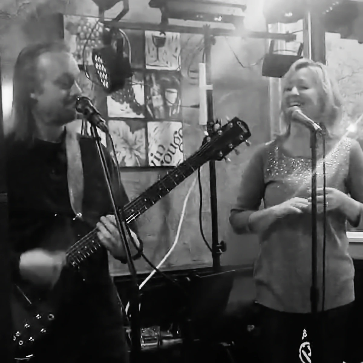 Duo-ly Noted playing live on stage